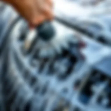 Detailed view of a car being washed with care